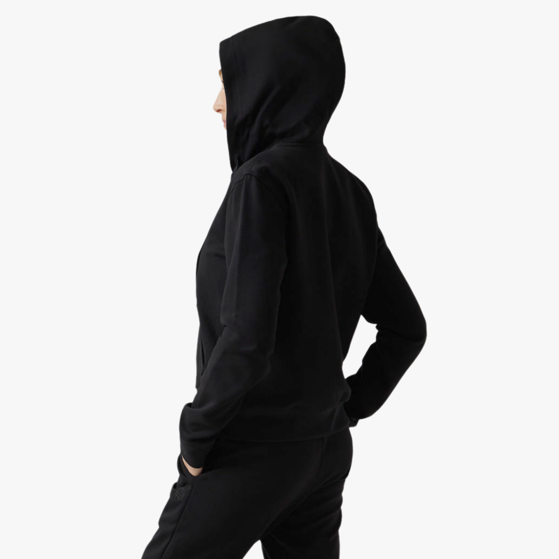 Female model wears hooded black set