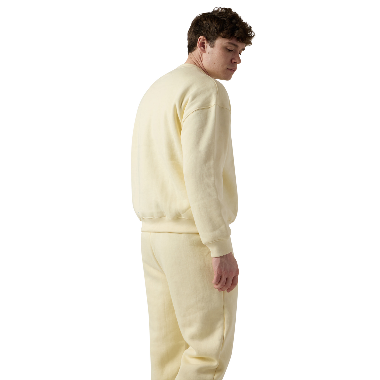 Male model wears beige fleece set