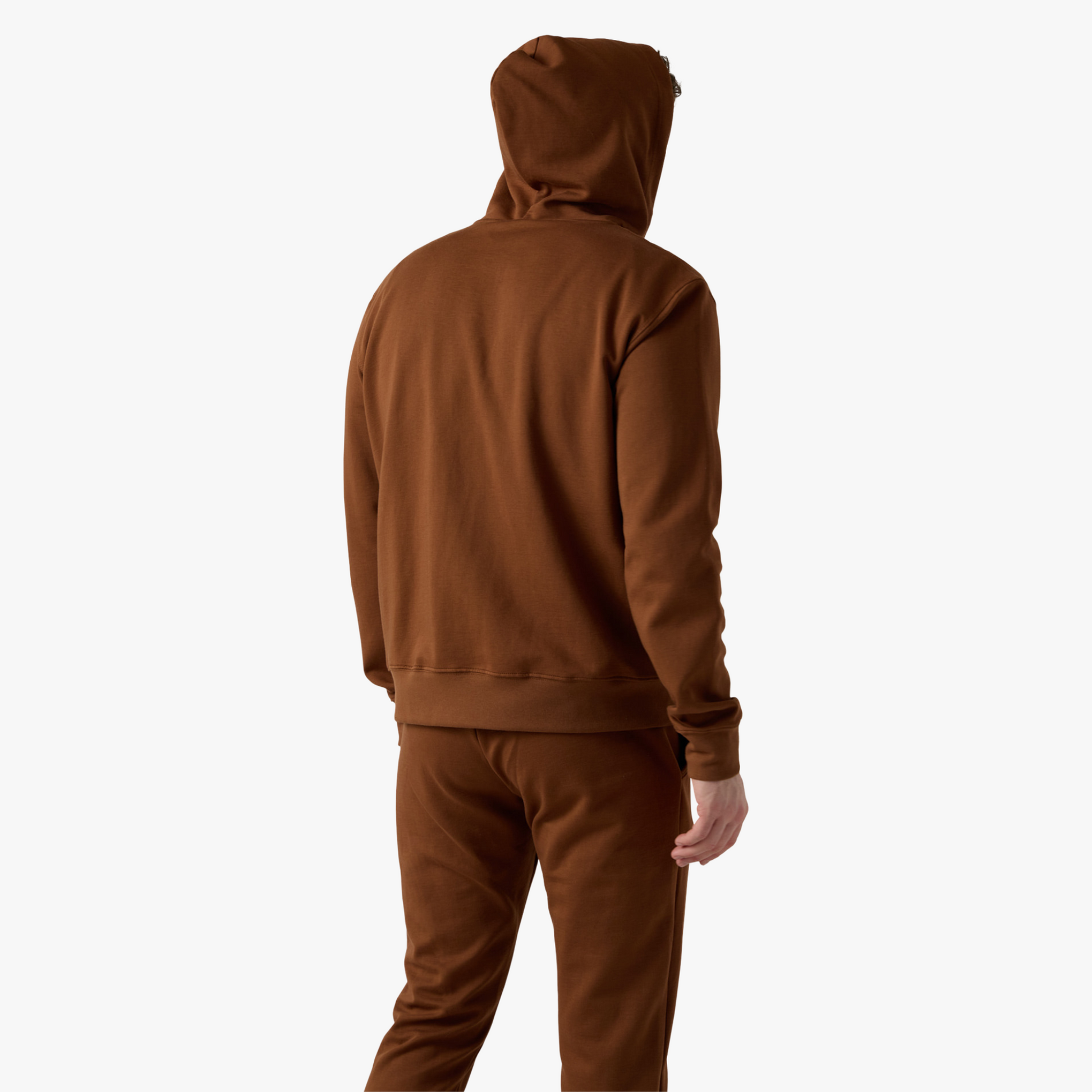 Male model wears brown hooded set