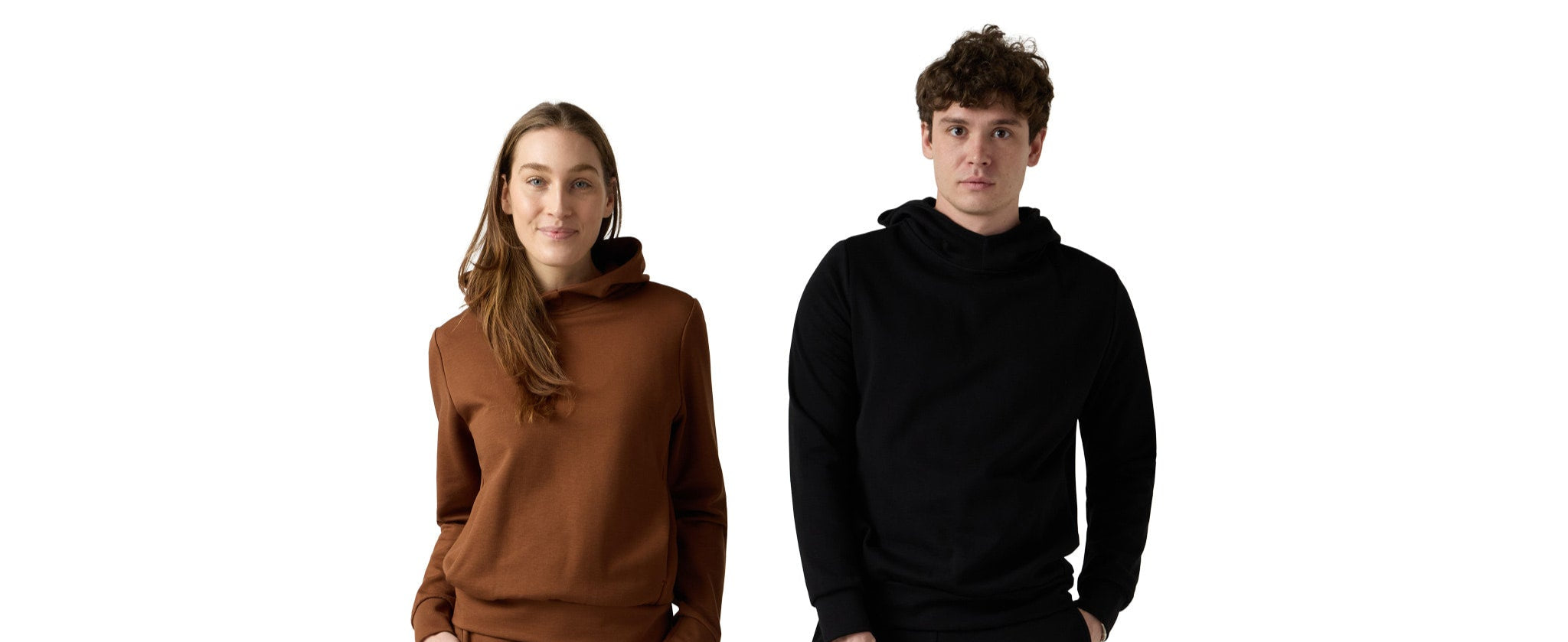 Couple photo with female wearing brown hoodie and male wearing black hoodie