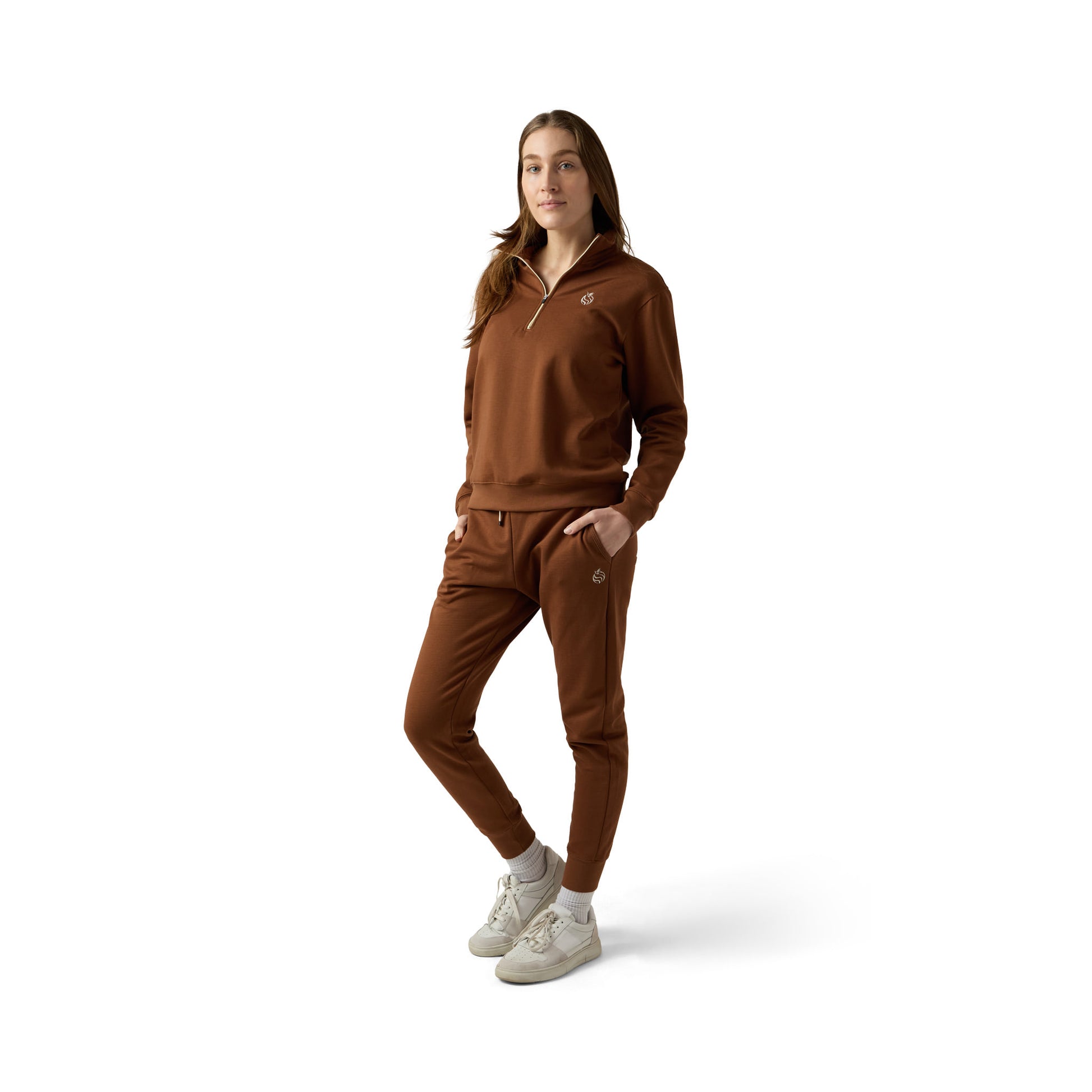 Female model wears brown set