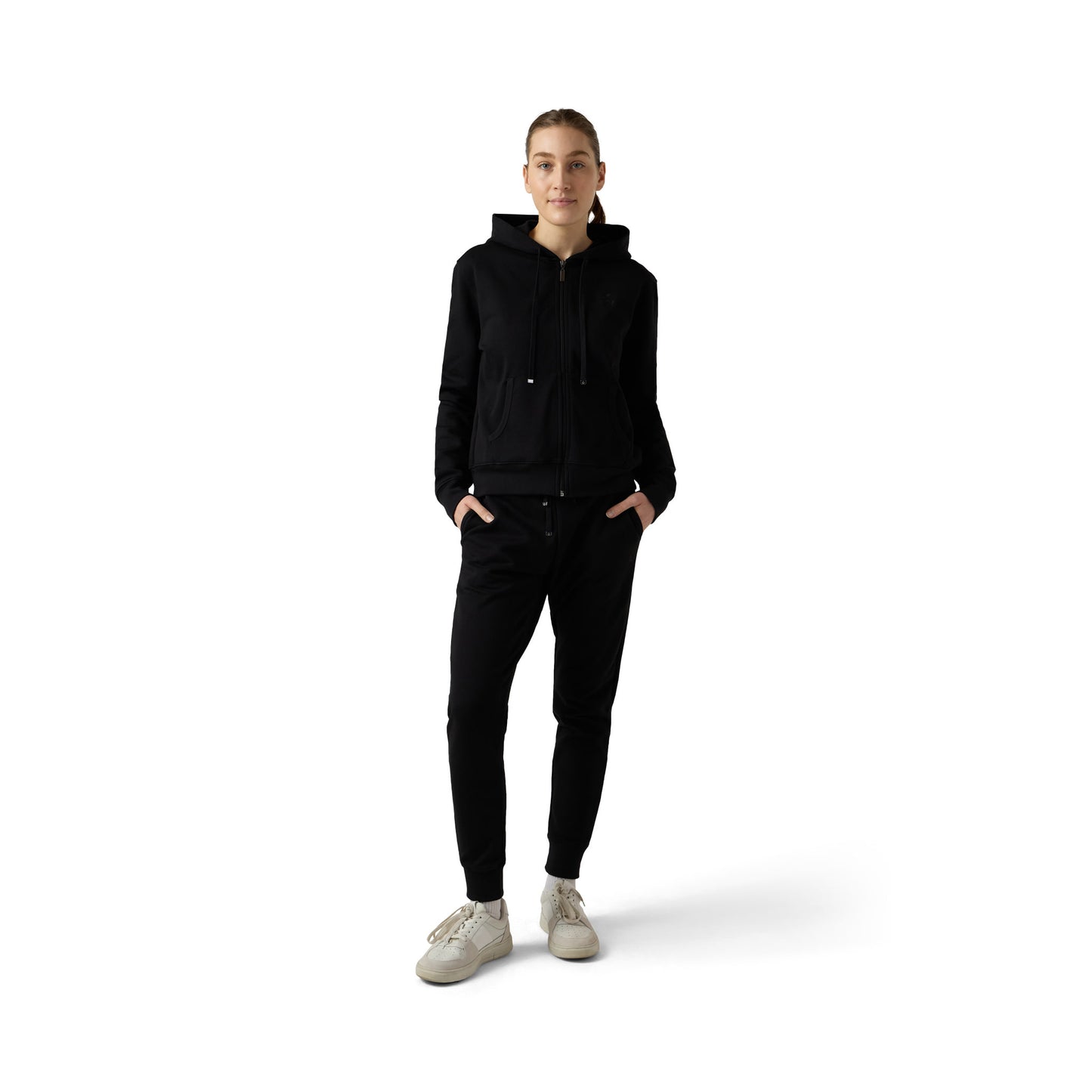 Female model wears black full zip set with joggers