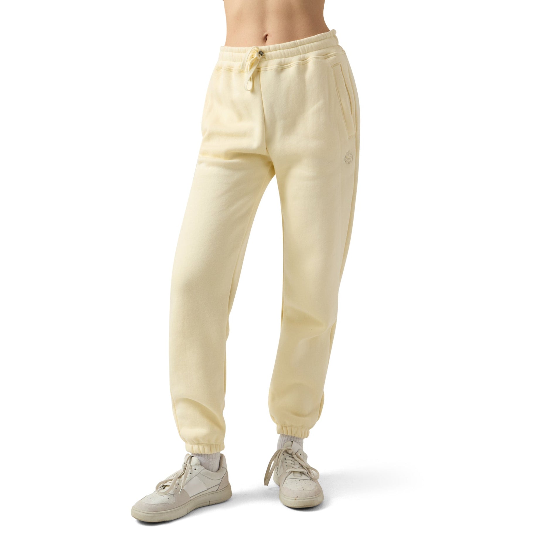 Female wears beige sweatpants
