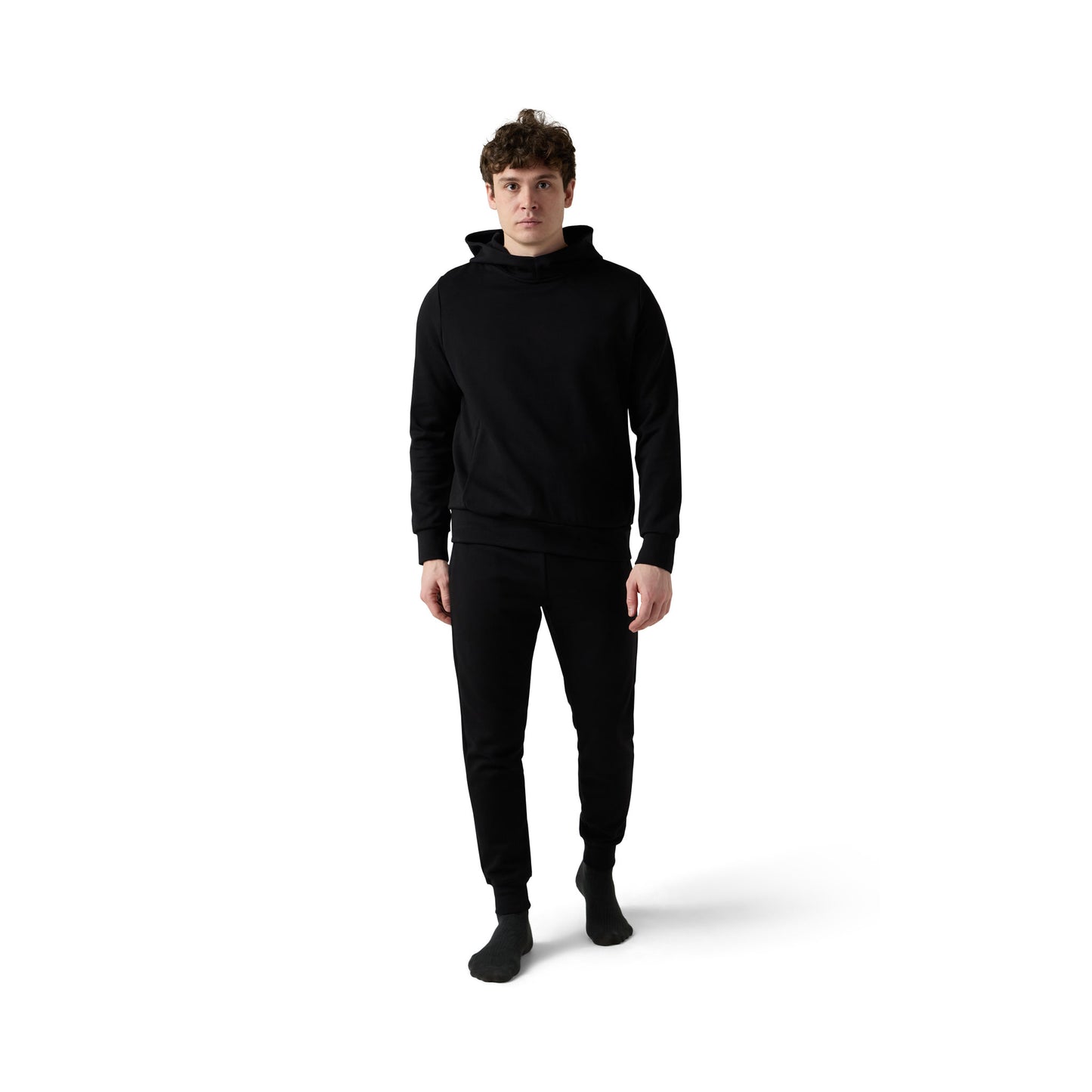 Male model wears black funnel neck hoodie set with joggers