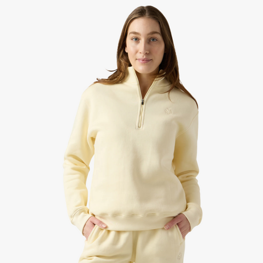 Female model wear beige fleece half zip