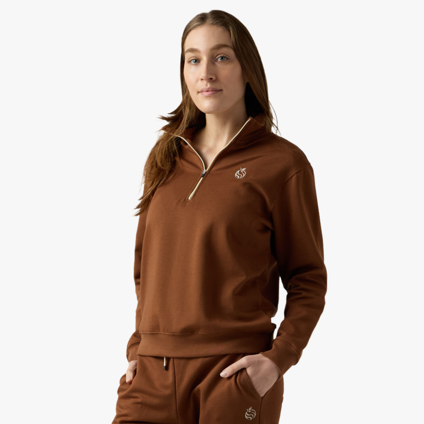 Female model wears brown half zip 
